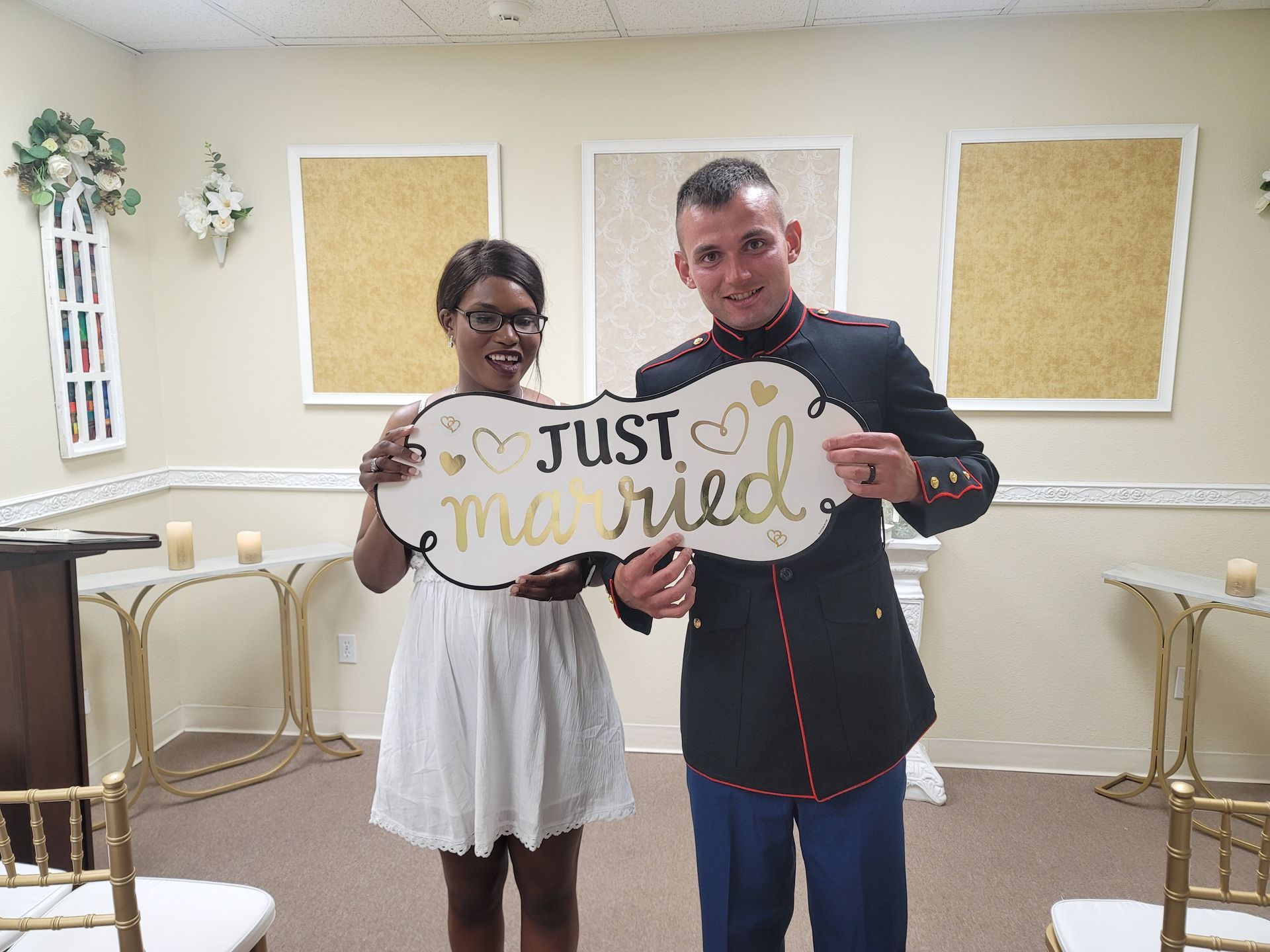 Newly married couple holding a