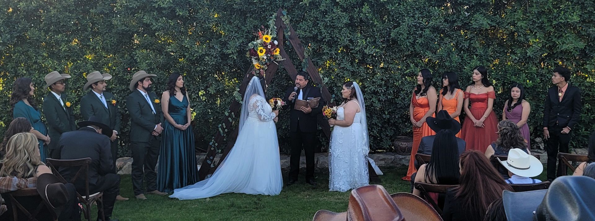 Two Brides say 'I Do' at Rancho El Refugio in Thousand Palms, CA with Rev. Steve officiating.