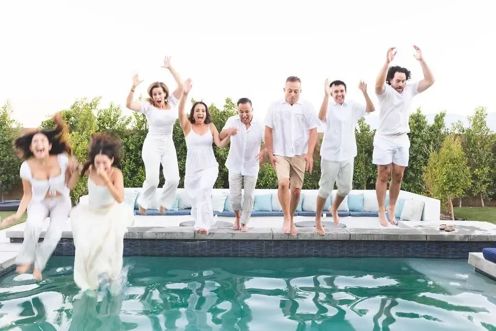 Family Celebrates Parents Vow Renewal with a Group Pool Jump - PHOTO CREDIT: Zyra Raguo - Kuwento Images