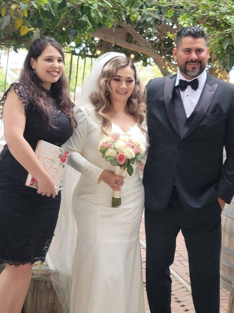 Rev. Zamora with a Bride and Groom after their destination celebration