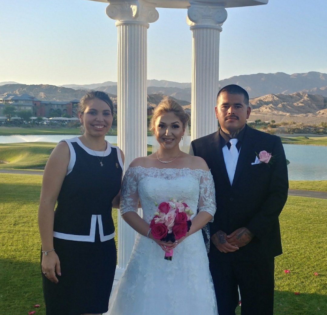 Rev. Zamora with a newly married couple at an Indio, CA Golf Course