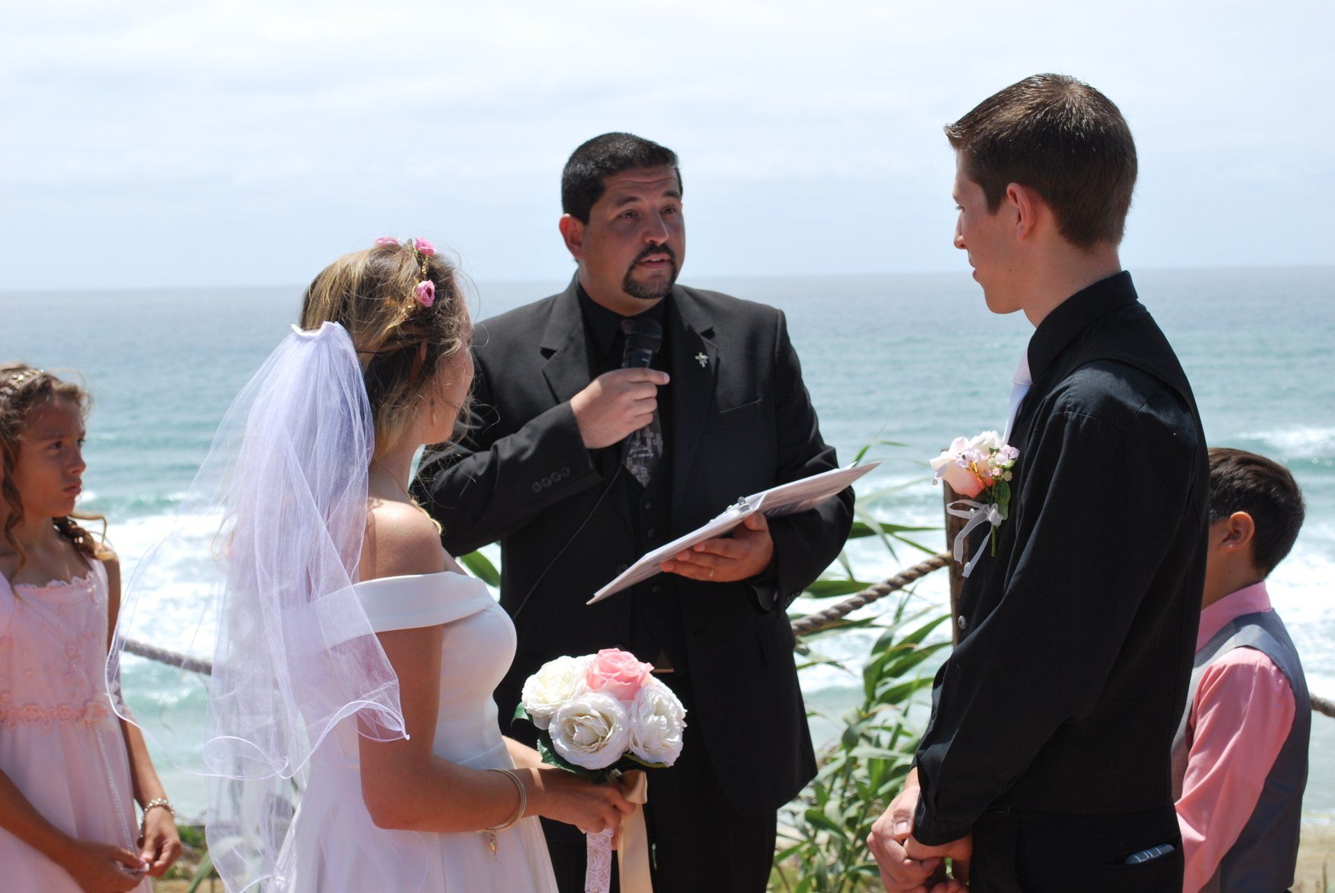 Del Mar Beach Wedding for this couple and guests officiated by Rev. Steve