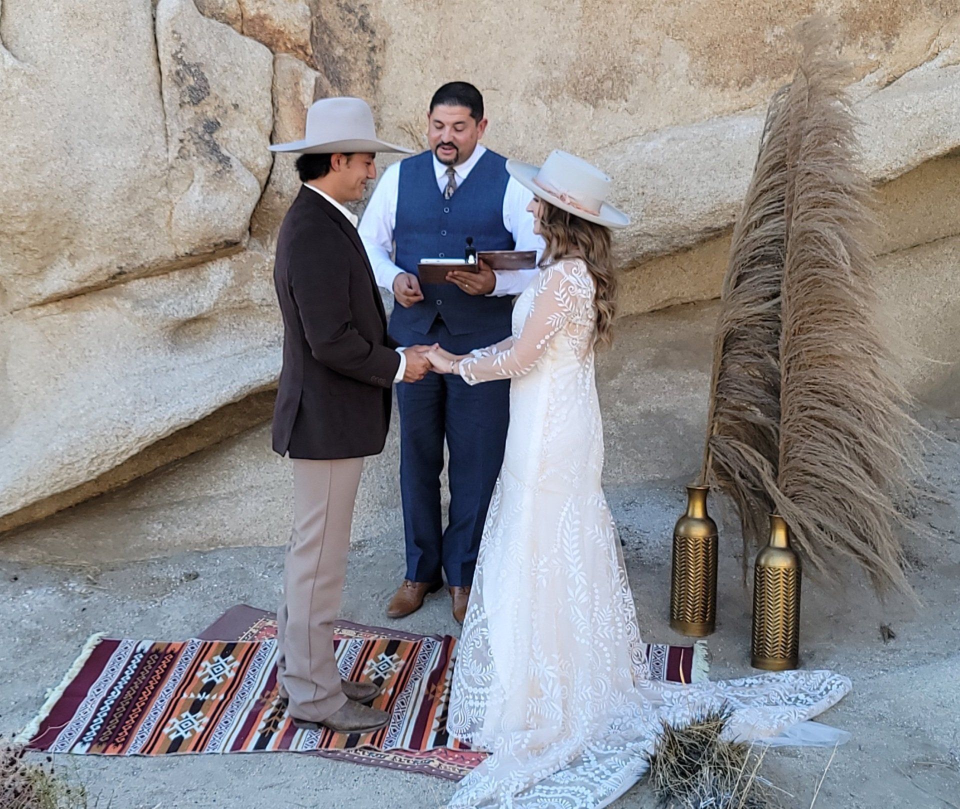 Pampas Grass, Gold Vases, Southwest Carpet, Boots and Cowboy hats all on the menu for tis Joshua Tree Wedding.