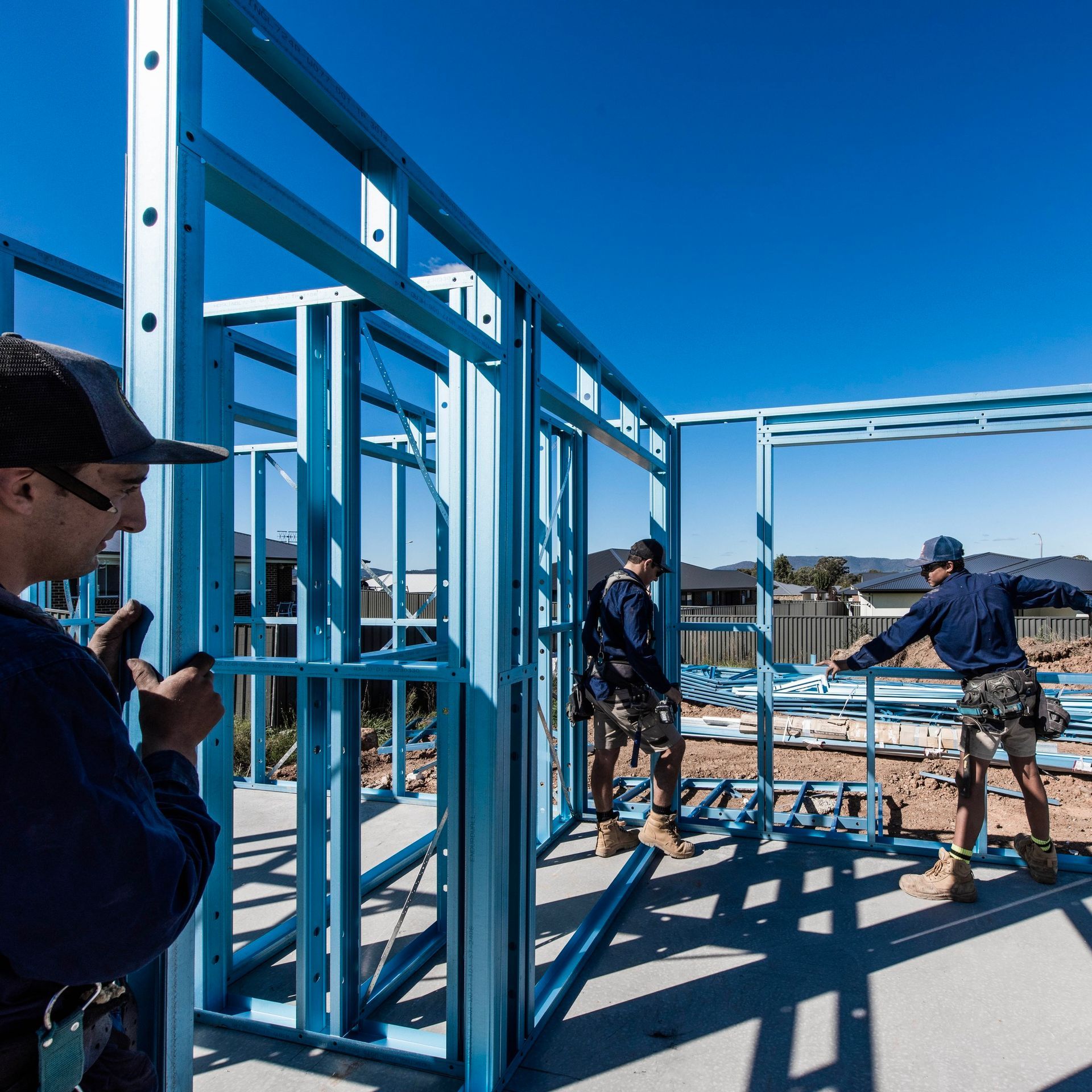 A Group of Construction Workers Are Working on a Building — Steel Frame Company In Cowra, NSW