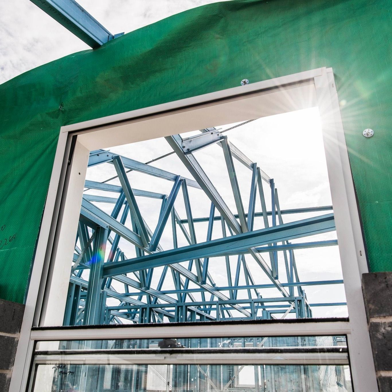A View of a Building Under Construction Through a Window — Steel Frame Company In Mudgee, NSW