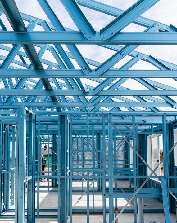 A Close Up of a Blue Metal Structure— Steel Frame Company In Mudgee, NSW