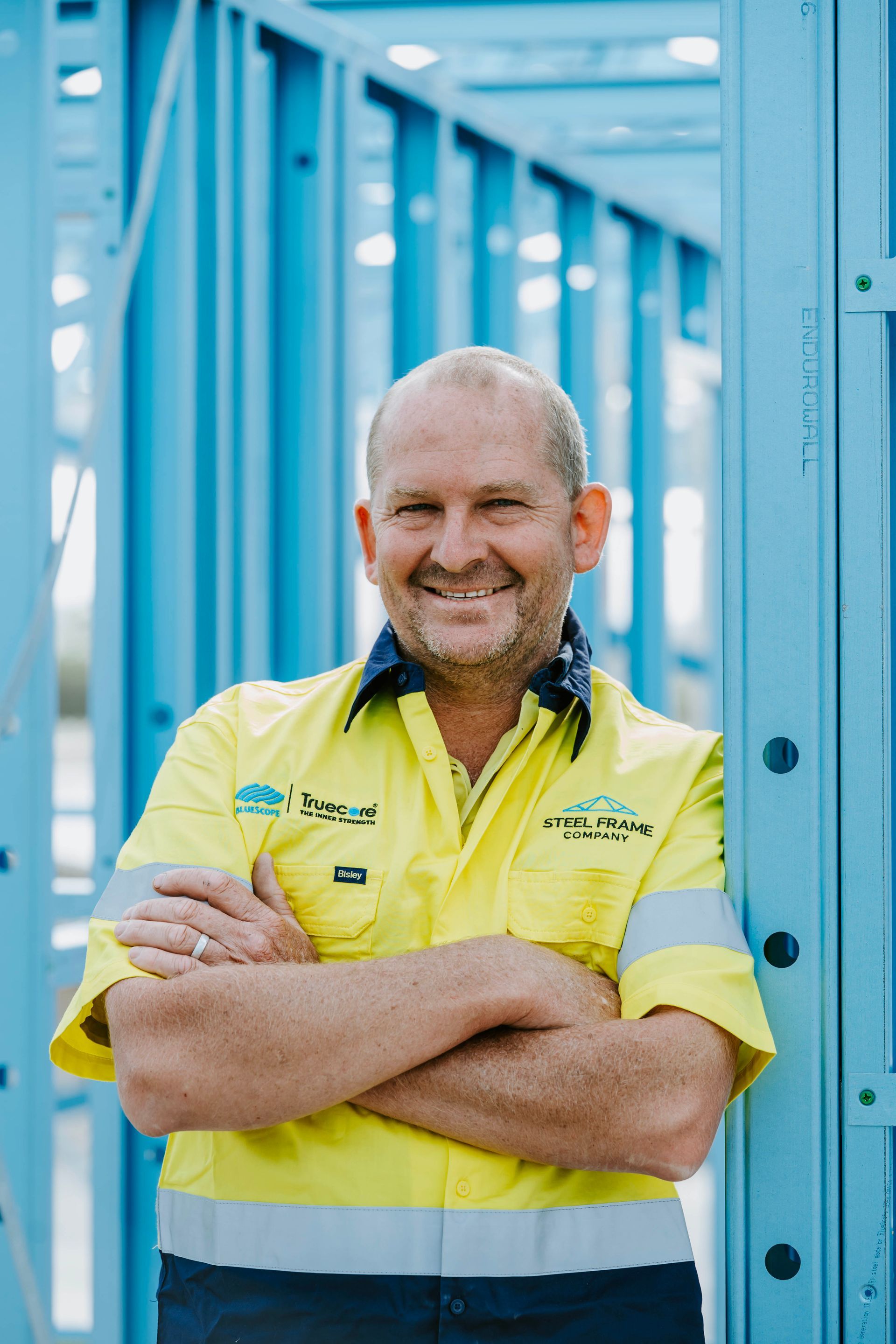 A Man in a Warehouse — Steel Frame Company In Mudgee, NSW