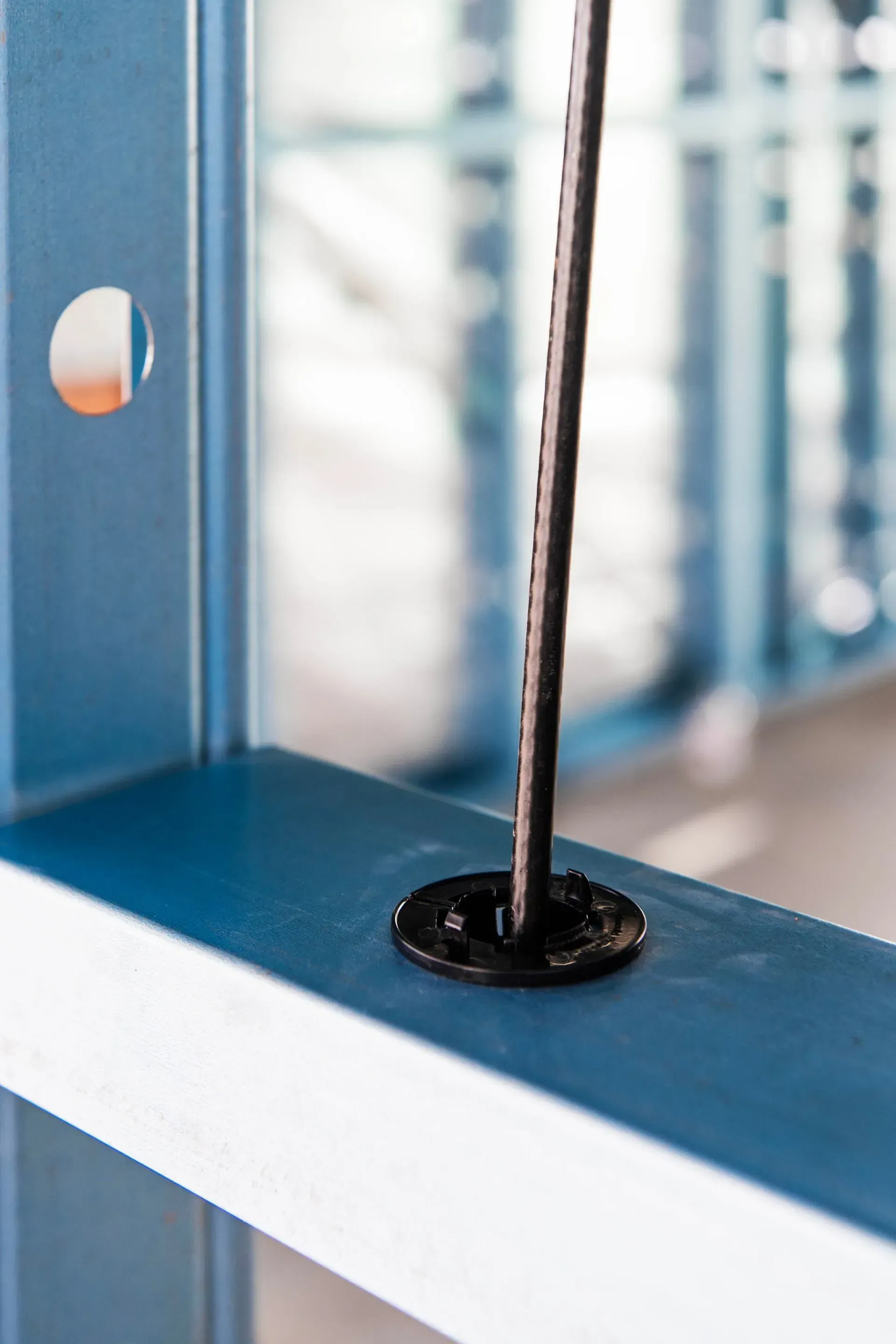A Close Up of a Metal Beam With a Screw in It — Steel Frame Company In Mudgee, NSW