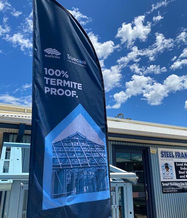 A Banner That Says 100 % Termite Proof on It — Steel Frame Company In Cowra, NSW