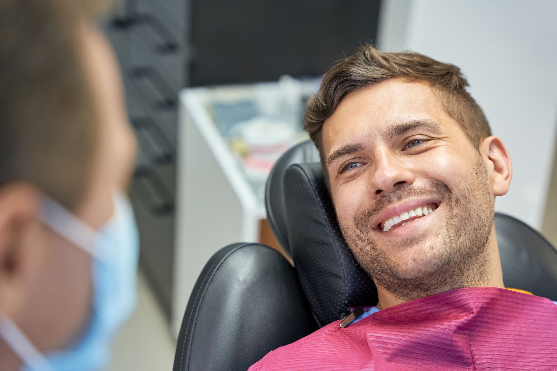 Man with a restored smile | Visit a restorative dentist in Davenport, FL.