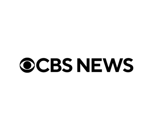 CBS News logo, black text and eye symbol on a white background.