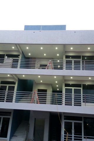 A large building with a lot of windows and balconies