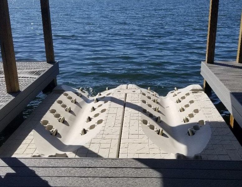 A dock with a large white object in the water