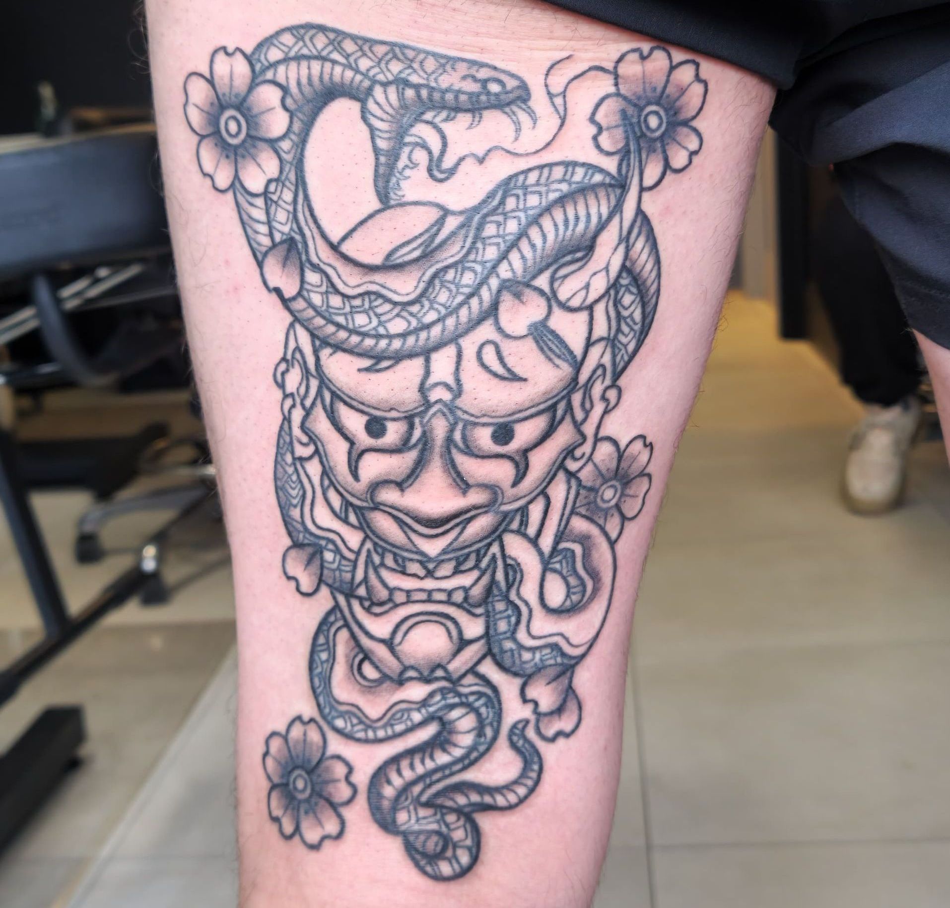 Oni Mask Tattoo On Leg