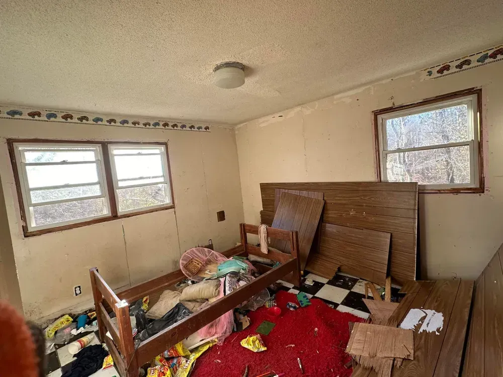 There is a bunk bed in the middle of the room.