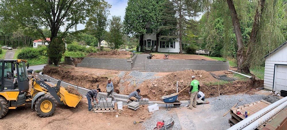 Installation of Multi Level Retaining Wall — Pine Bush, NY — Creative Touch Landscaping & Home Improvement Inc.
