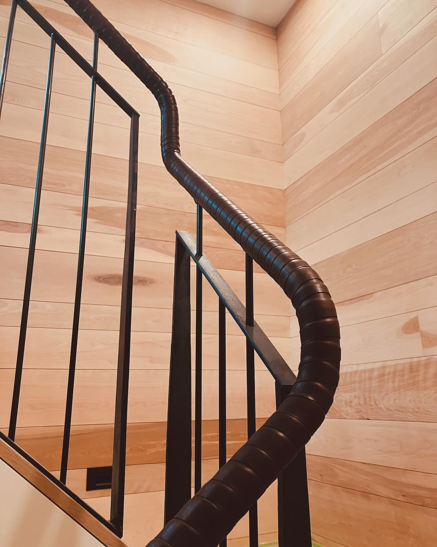 Interior hand rail wrapped in leather