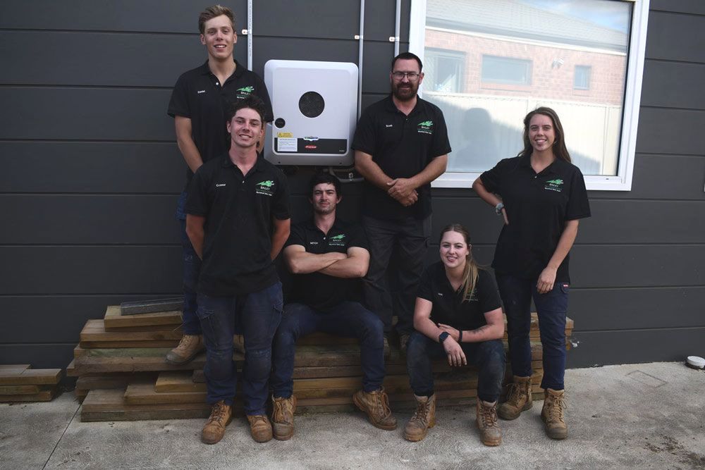 Group Picture of Man and Woman — Electrical Services in Lake Gardens VIC