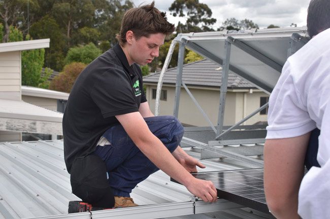 Man Installing Solar Panel — Electrical Services in Lake Gardens VIC
