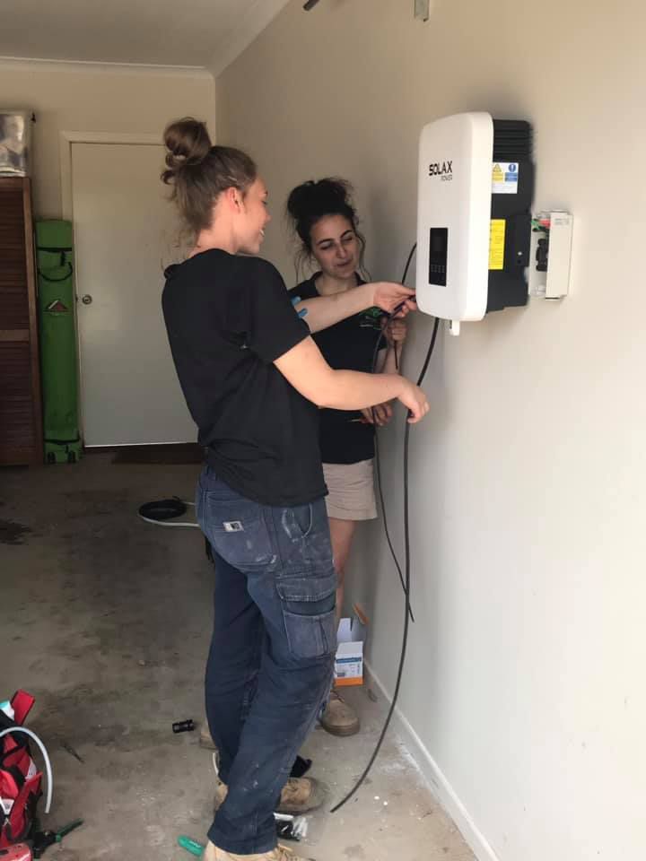 Two Ladies Working with the Electrical Wires — Electrical Services in Lake Gardens VIC