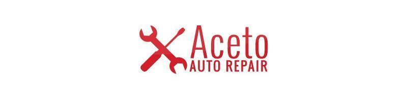 A red and white logo for aceto auto repair
