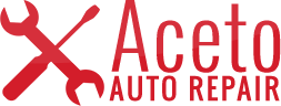 A red logo for aceto auto repair with a wrench