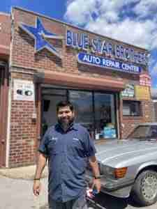 Our mechanic in Front of Our Service in Glendale, Queens | Blue Star Brothers