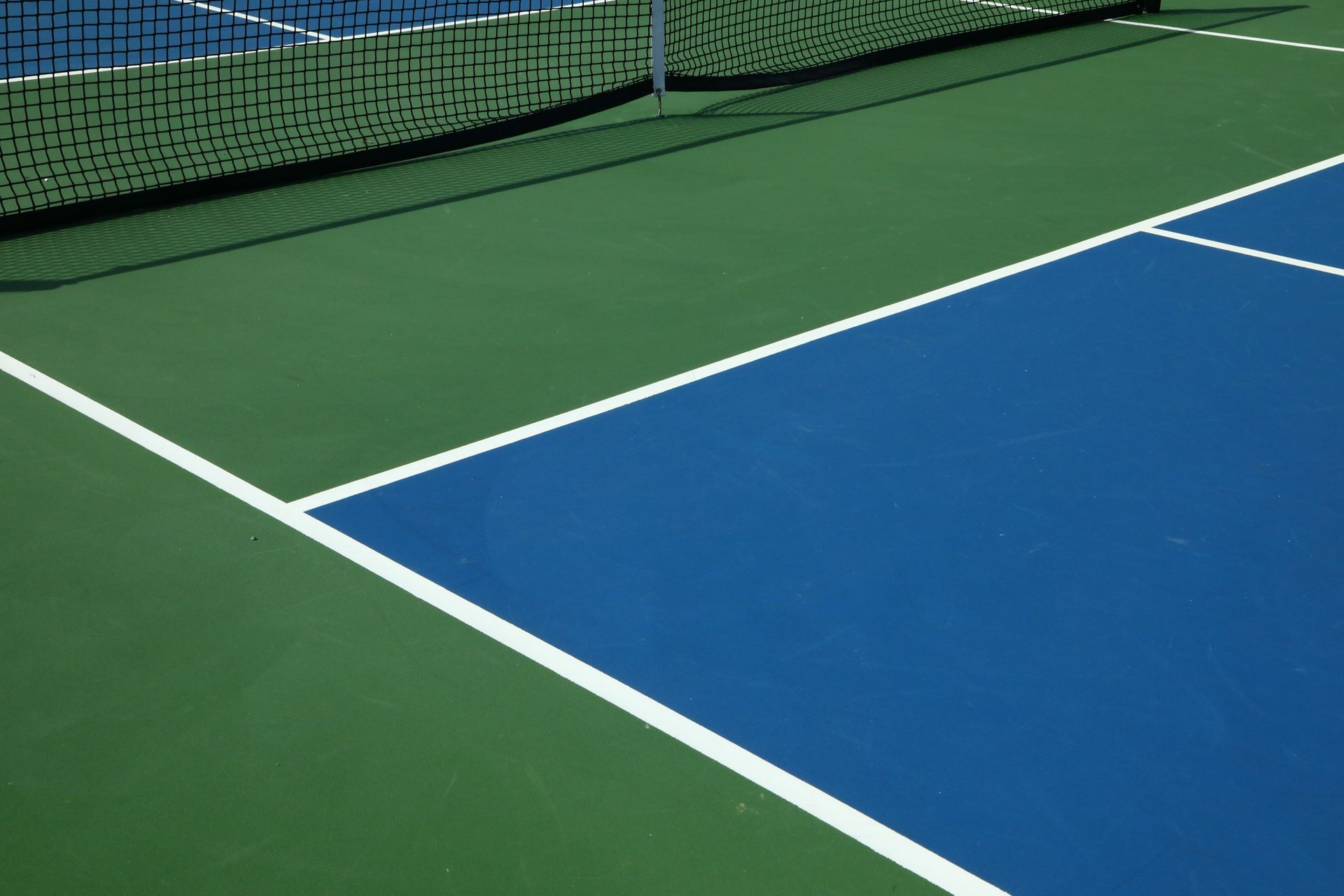 Basketball Court with Colorful Circles and Fencing — Tucker, GA — A-1 Driveway Replacement Company