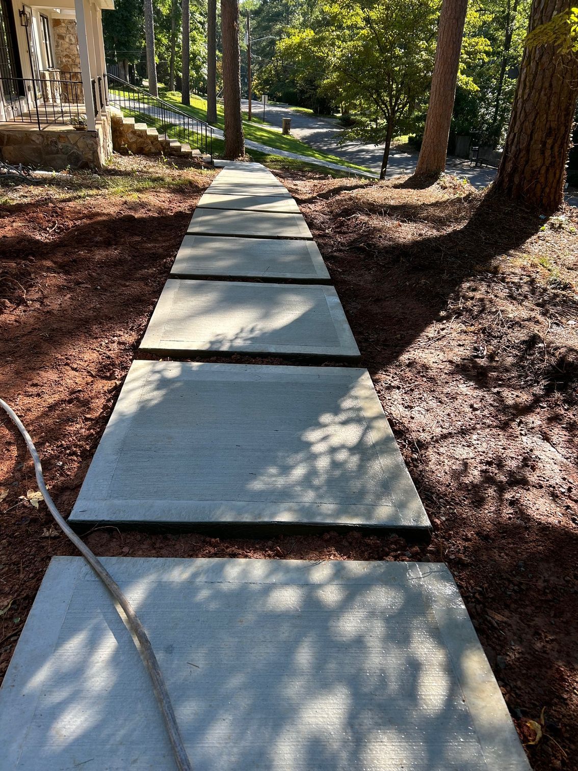 Concrete Slab Walkway Through a Wooded Area — Tucker, GA — A-1 Driveway Replacement Company