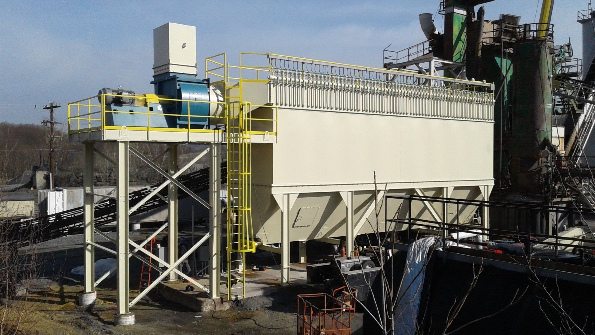 An aerial view of a factory with a lot of machinery
