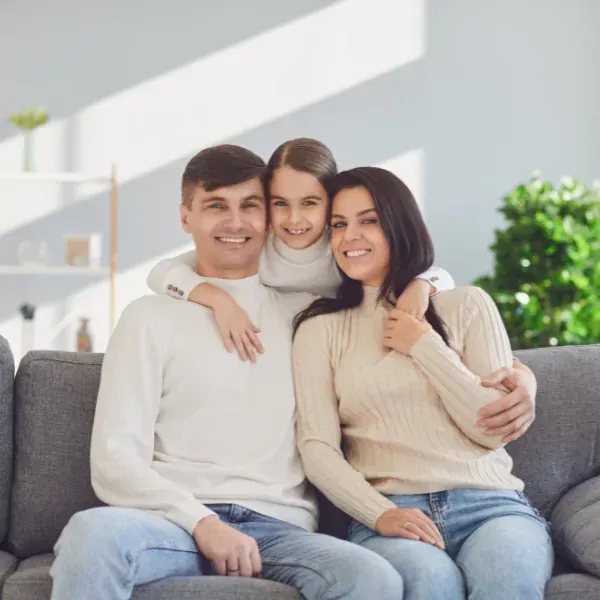 An image showing a family feeling relieved and secure.