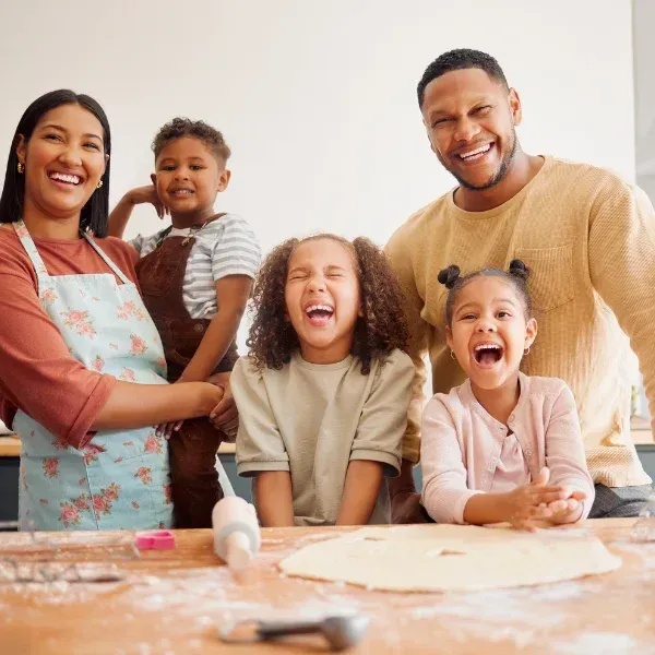 An image showing a happy family with children.