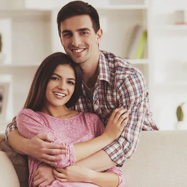 An image showing young adults discussing life insurance options.