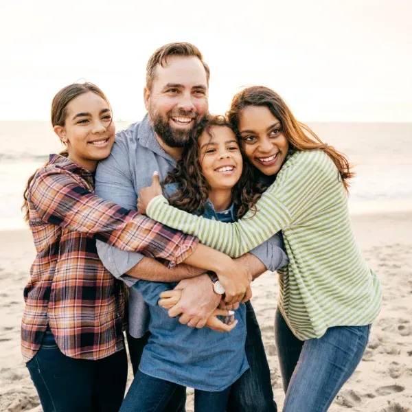An image showing a happy family with children.