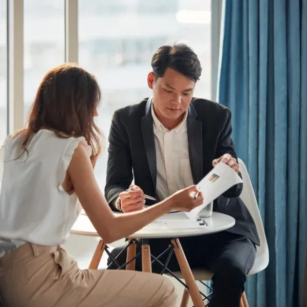 An image showing a person discussing term life insurance options.