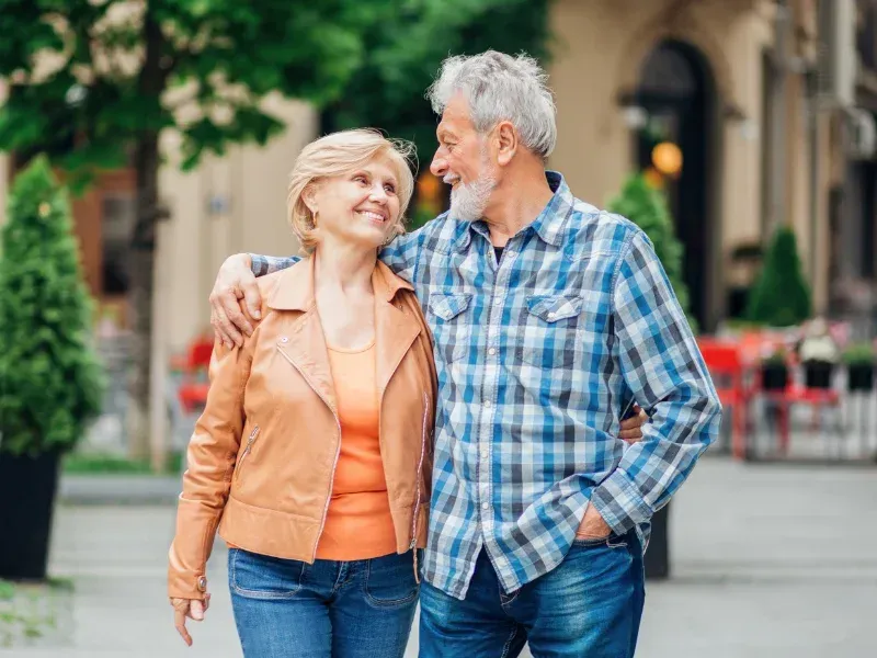 A happy older couple after protecting their family with final expense insurance in South Carolina.
