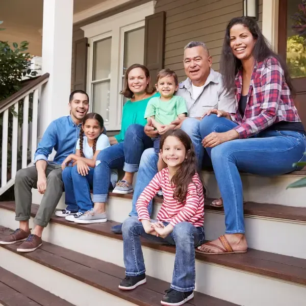 Image showing a multi-generational family in a supportive embrace.