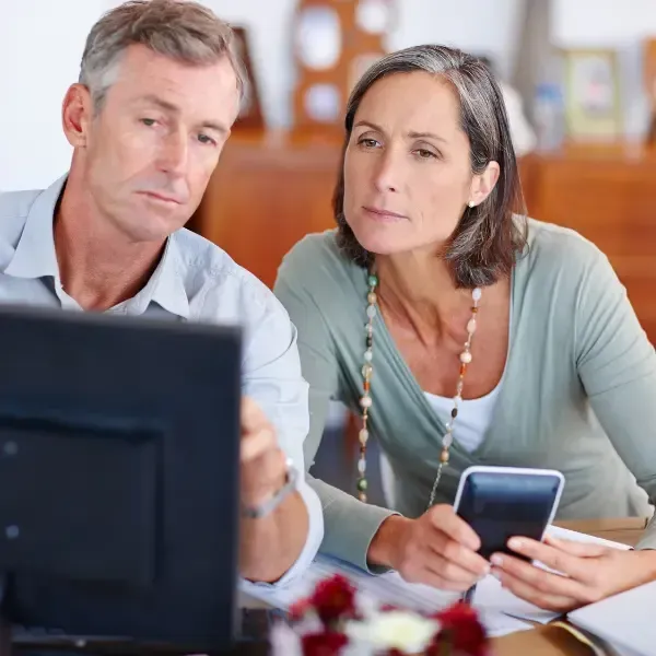 Image showing a senior couple reviewing their finances.