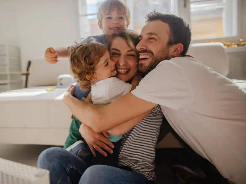 Image showing a happy family feeling secure with a Univeral Index Life Insurance Policy.