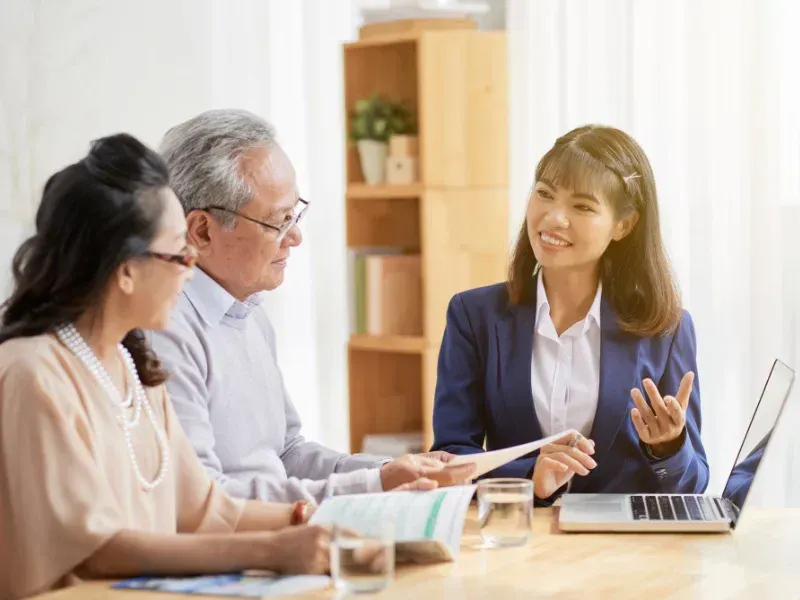 An image showing seniors discussing term life insurance options in South Carolina.