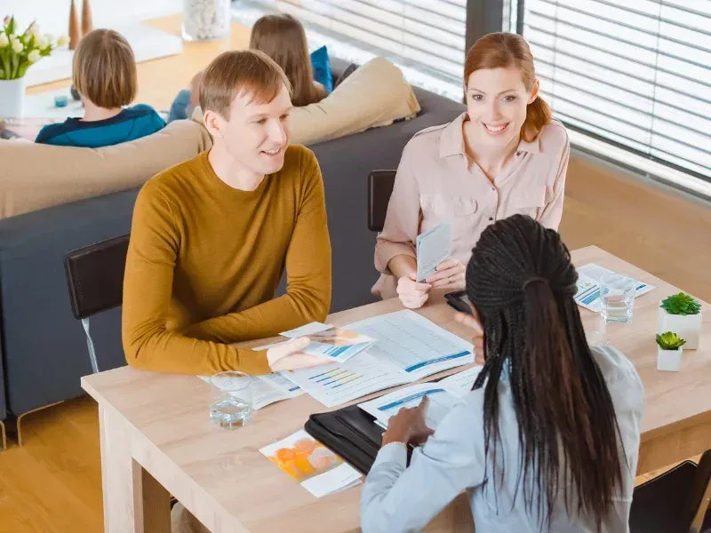 An image showing a family discussing term life insurance options.