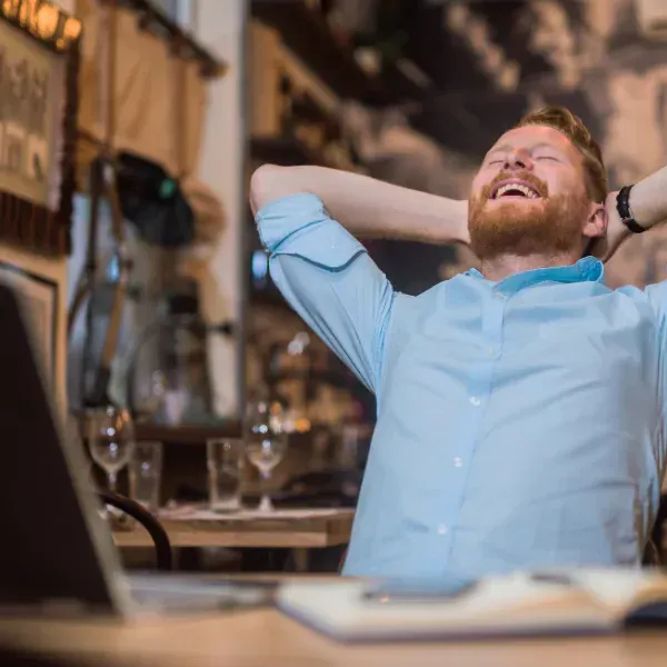 An image showing a relieved policyholder given access to their policy cash value.