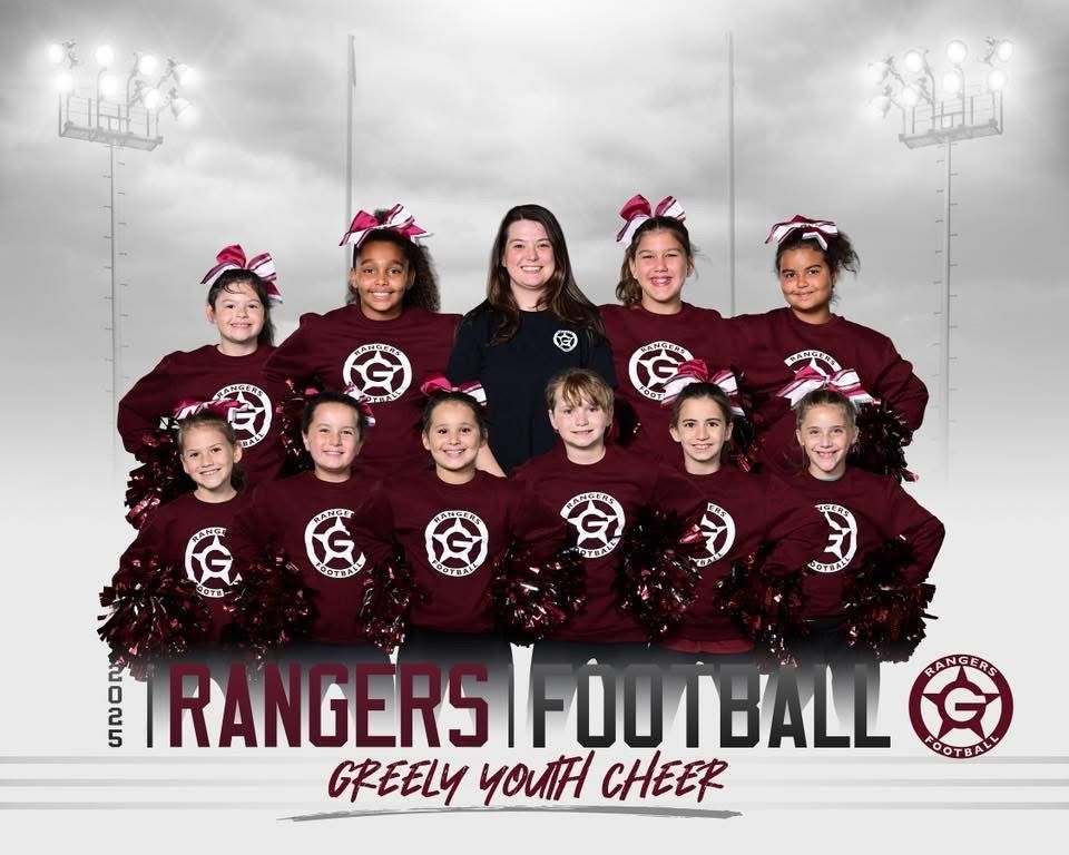 Youth cheer team photo in maroon uniforms with Rangers Football banner and cheerleading pom-poms