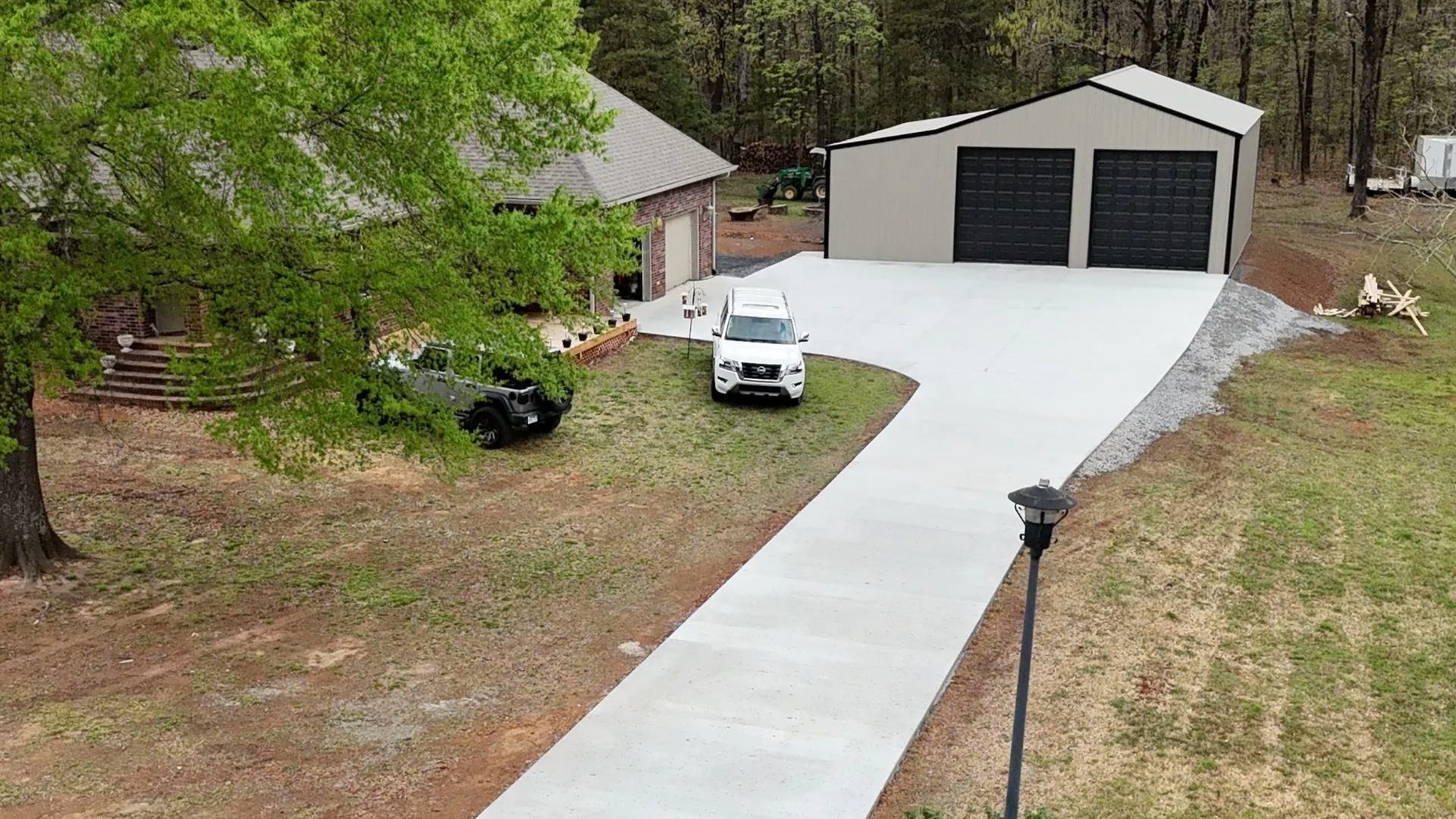 Residential concrete driveway installation in Central Arkansas with proper grading, reinforcement