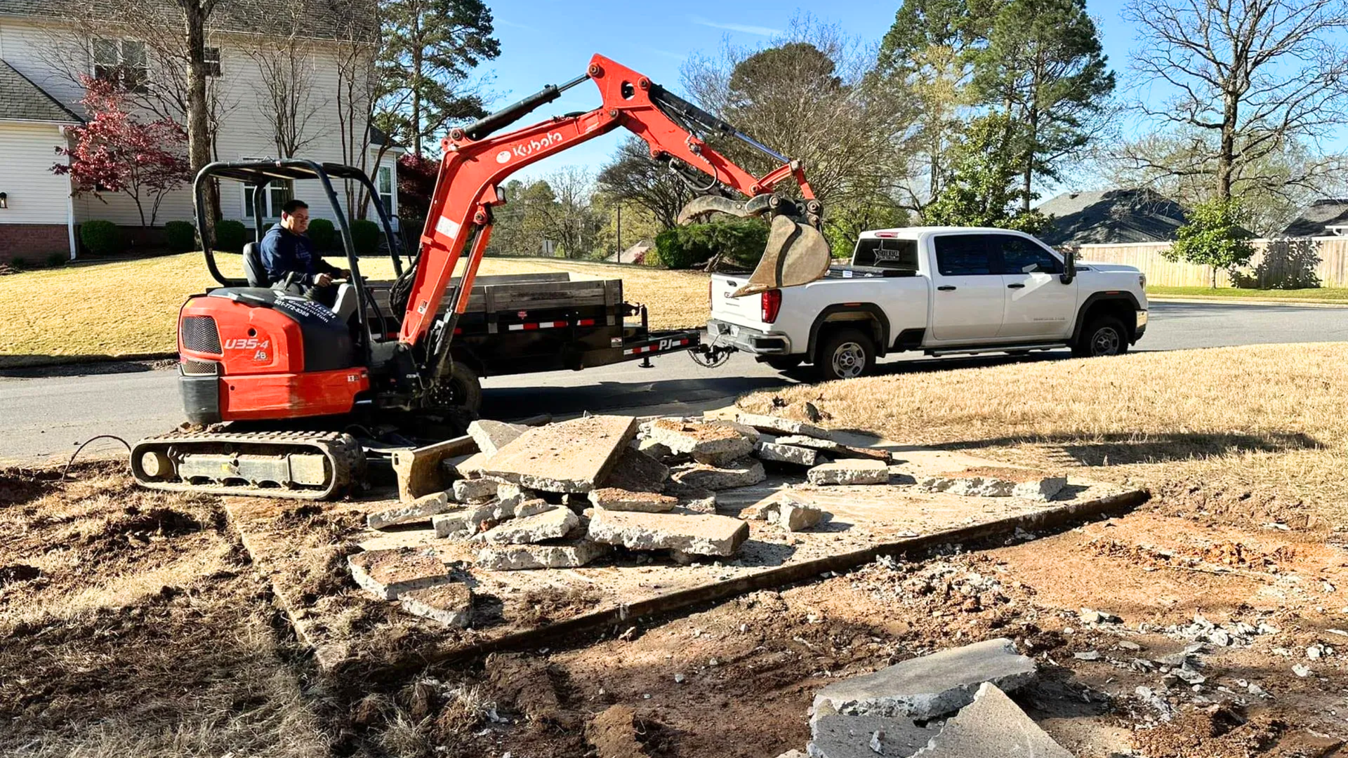 Concrete installation process showing site preparation, forming, and pouring for residential and commercial concrete projects