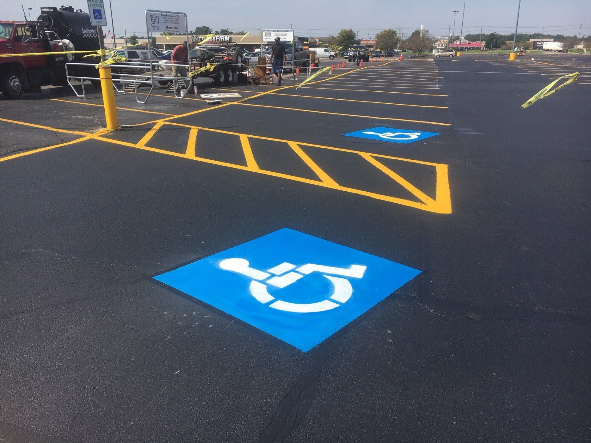 Car Parked on A Large Parking Lot — Houston, TX — HEV Asphalt Paving Co.
