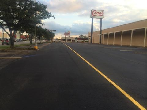 Yellow Line On Asphalt Road — Houston, TX — HEV Asphalt Paving Co.