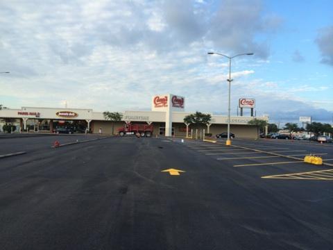 Parking Lot with Yellow Directional Arrow — Houston, TX — HEV Asphalt Paving Co.