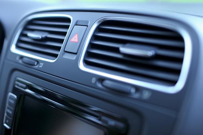 A Close Up of the Air Vents in a Car With a Radio — Regional Auto Electrics In Fairy Meadow, NSW