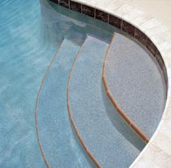 steps leading into a swimming pool